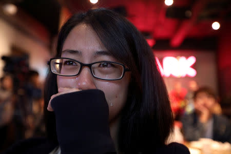 An LGBT supporter cries after losing the referendum in Taipei, Taiwan November 24, 2018. REUTERS/Ann Wang