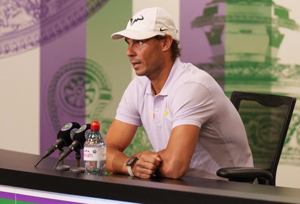 Rafa Nadal, pictured here speaking to the media at Wimbledon after withdrawing.