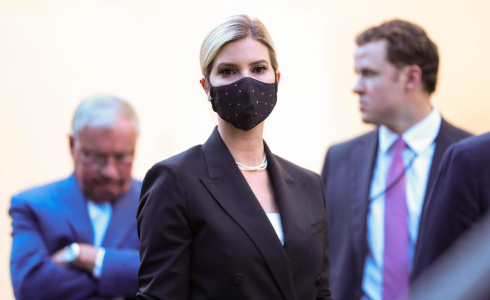 FILE PHOTO: White House senior advisor Ivanka Trump watches her father U.S. President Donald Trump hold a photo opportunity in front of St. John's Episcopal Church across from the White House during ongoing protests over racial inequality in the wake of the death of George Floyd while in Minneapolis police custody, outside the White House in Washington, U.S., June 1, 2020. REUTERS/Tom Brenner