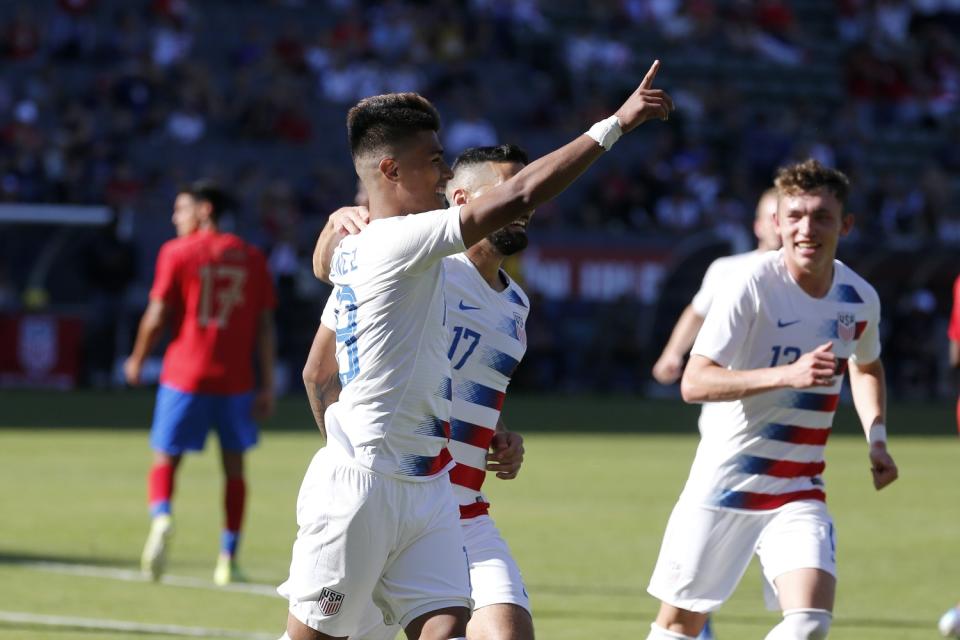 USA's Ulysses Llanez, left, celebrates after scoring against Costa Rica in a February friendly match in Carson.