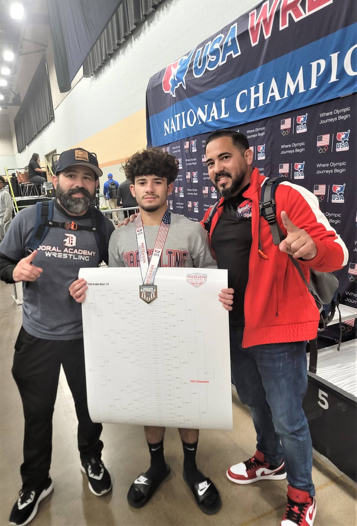 Christian Vazquez (113 pounds) of Doral Academy wrestling takes first at nationals in Des Moines, Iowa. Photo Courtesy Doral Academy Wrestling