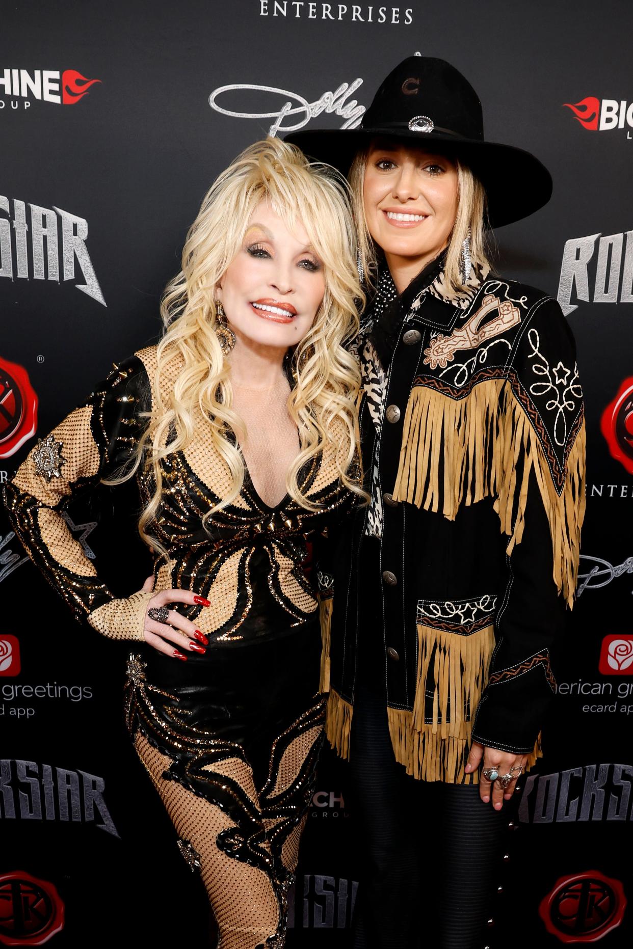 Dolly Parton and Lainey Wilson attend Dolly Parton's Rockstar VIP Album Release Party with American Greetings on November 16, 2023 in Nashville, Tennessee.
