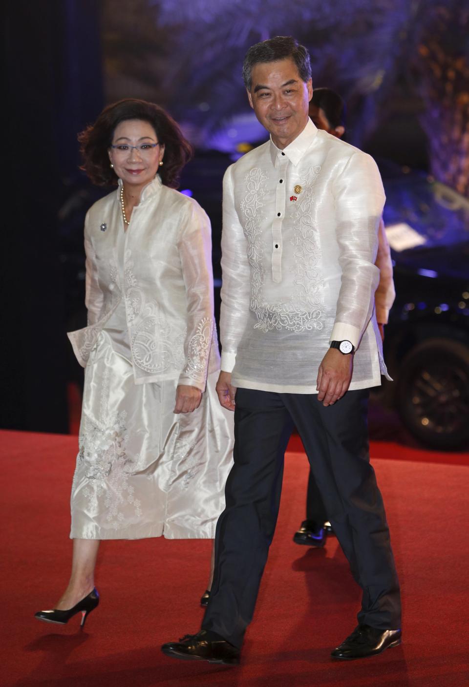 Chief Executive of Hong Kong Leung Chun-ying and his wife Regina Tong Ching-yi for a welcome dinner during the Asia-Pacific Economic Cooperation (APEC) summit in the capital city of Manila, Philippines