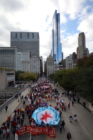 Teachers protest during a rally on the first day of a teacher strike in Chicago