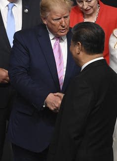 <span class="caption">Can Trump and Xi Jinping provide the kind of leadership needed to avert a global financial crisis in the wake of coronavirus?</span> <span class="attribution"><a class="link " href="https://webgate.epa.eu/?20370008538715063107&SCOPE=QUEUE&EVENT=DISPLAY&LIGHTBOX=12808" rel="nofollow noopener" target="_blank" data-ylk="slk:Kukas Coch/EPA;elm:context_link;itc:0;sec:content-canvas">Kukas Coch/EPA</a></span>