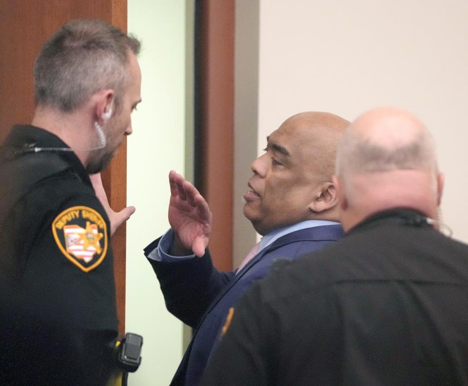 Andrew Mitchell, 59, waves to family in the gallery on April 18, 2023, after a Franklin County jury determined that he was not guilty of murder and voluntary manslaughter in connection with the fatal shooting of Donna Dalton Castleberry, 23, in August 2018.