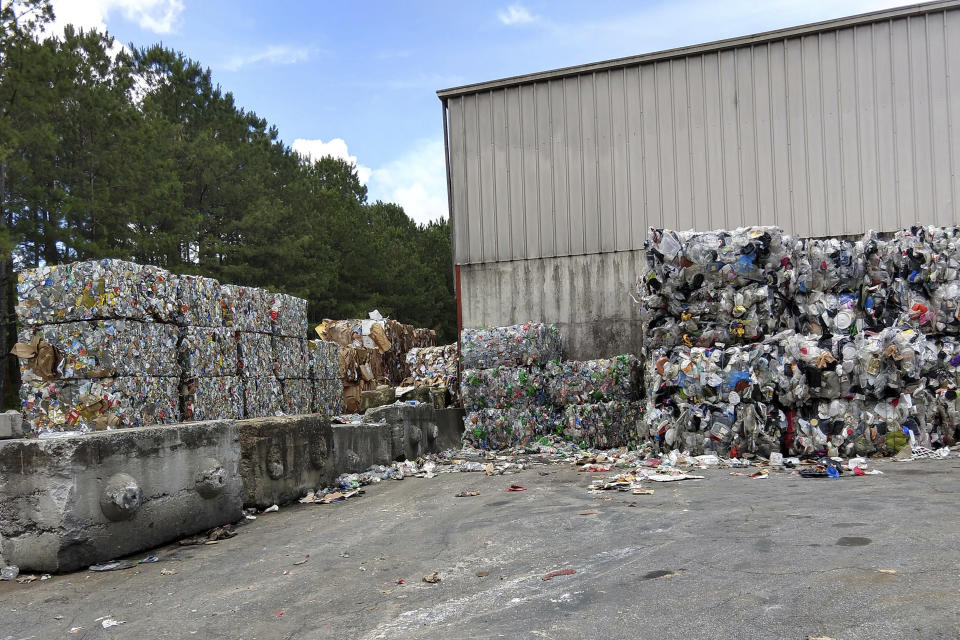 This 2018 photo provided by researcher Jenna Jambeck shows plastic baled for shipment at a materials recovery facility in the United States. According to a study released on Friday, Oct. 30, 2020, more than a million tons a year of America's plastic trash isn't ending up where it should. The equivalent of as many as 1,300 plastic grocery bags per person is landing in places such as oceans and roadways. (Jenna Jambeck via AP)