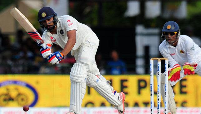 Sharma (l) on his way to fifty.