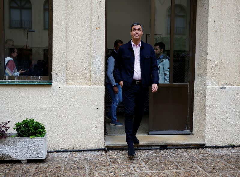 FILE PHOTO: Spain's Prime Minister Pedro Sanchez appears after he casts his vote at a polling station in Madrid