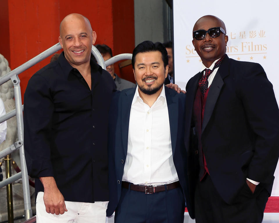 HOLLYWOOD, CA - JUNE 03:  (L-R) Actor Vin Diesel, director Justin Lin and rapper MC Hammer attend the Hand and Footprint Ceremony for Justin Lin, Zhao Wei and Huang Xiaoming at the TCL Chinese Theatre IMAX on June 3, 2015 in Hollywood, California.  (Photo by David Livingston/Getty Images)