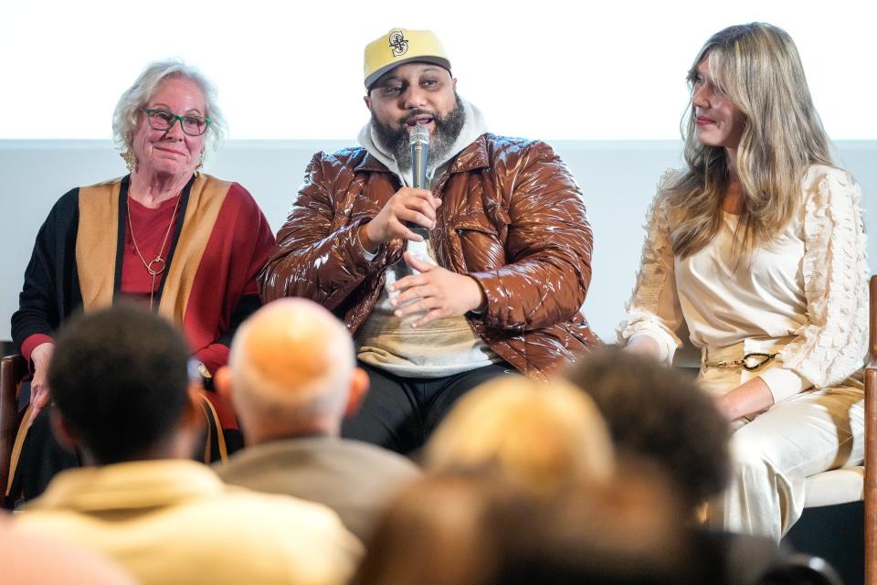 Ricardo Grant, founder of Paloozanoire, Club LoVe, Gallery At Gumbo and Cinema OTR, speaks during the Future of Downtown panel at the Contemporary Arts Center in downtown Cincinnati on Thursday, Dec. 14, 2023.