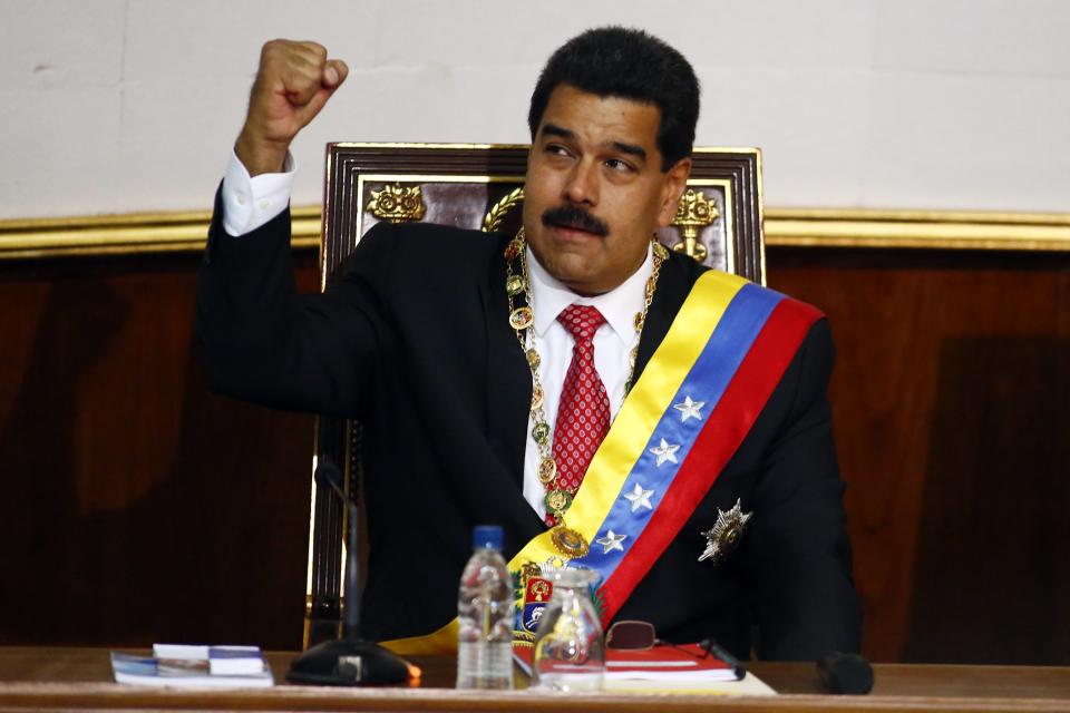 Venezuelan President Nicolas Maduro greets supporters after arriving at the National Assembly in Caracas