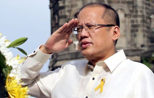 This photo, released by the Malacanang Photo Bureau (MPB), shows Philippine President Benigno Aquino saluting during the flag raising and wreath laying ceremonies in commemoration of the 114th Philippine Independence Day at the Barasoain Church Historical Landmark in Malolos, Bulacan, in June. Aquino will deliver his annual "state of the nation" speech to Congress on Monday