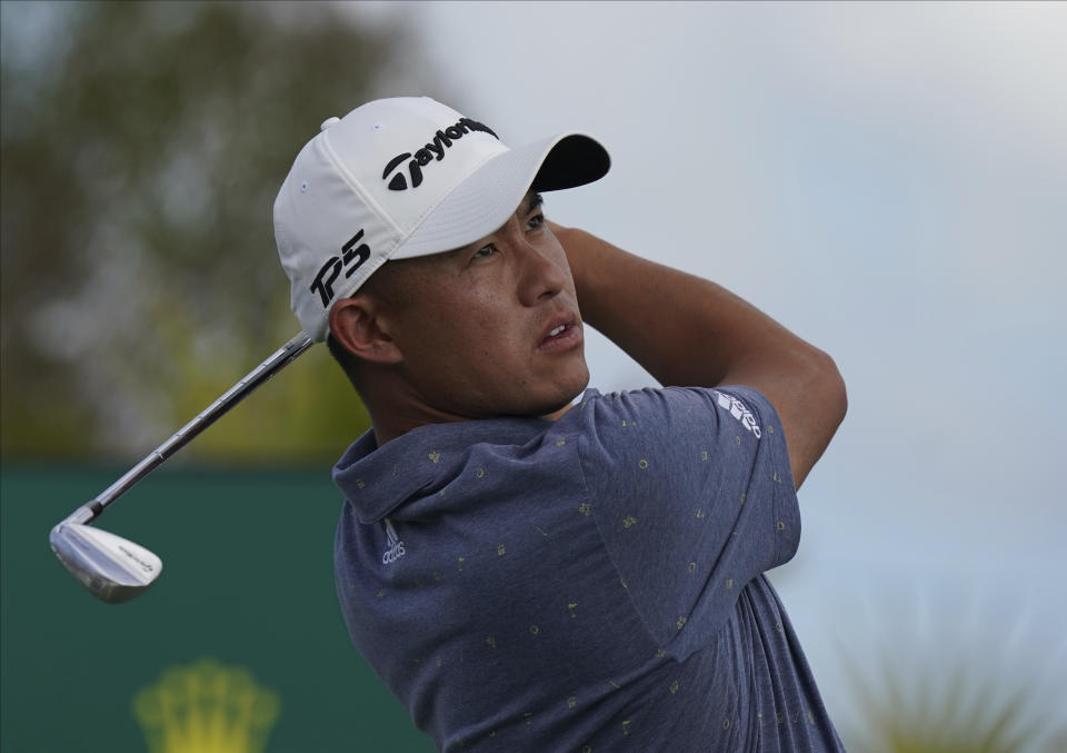 Collin Morikawa of the United States, watches his shot on the second tee on day three of the Hero World Challenge PGA Tour at the Albany Golf Club, in New Providence, Bahamas, Saturday, Dec. 4, 2021.(AP Photo/Fernando Llano)