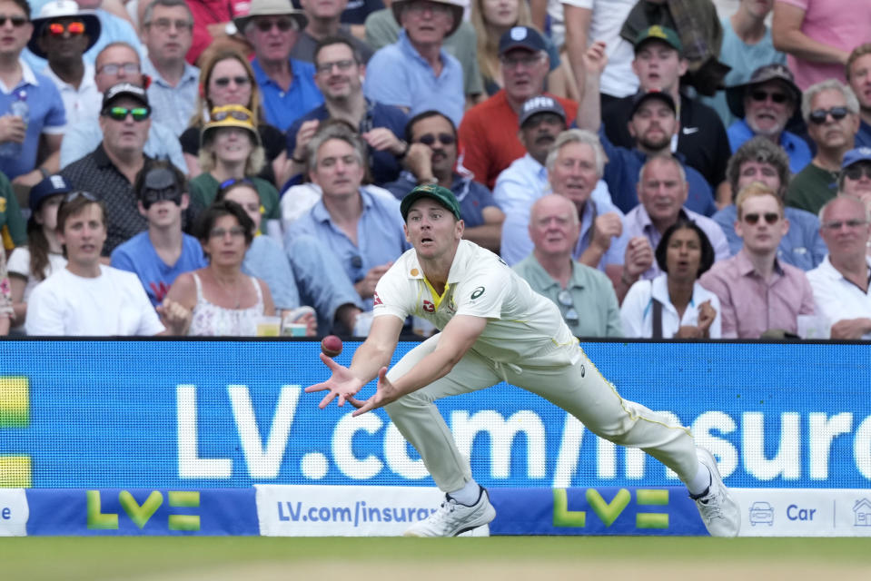 Australia's Josh Hazlewood fails to catch a ball from England's Moeen Ali on day three of the fifth Ashes Test match between England and Australia, at The Oval cricket ground in London, Saturday, July 29, 2023. (AP Photo/Kirsty Wigglesworth)