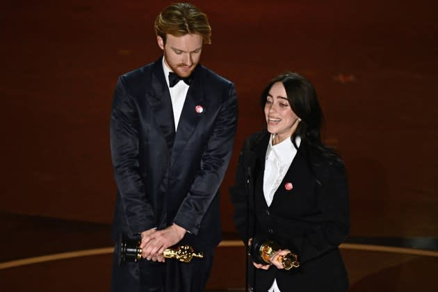 Billie Eilish and Finneas accept the award for Best Original Song for "What Was I Made For" from 'Barbie' at the Oscars - Credit: PATRICK T. FALLON/AFP/Getty Images