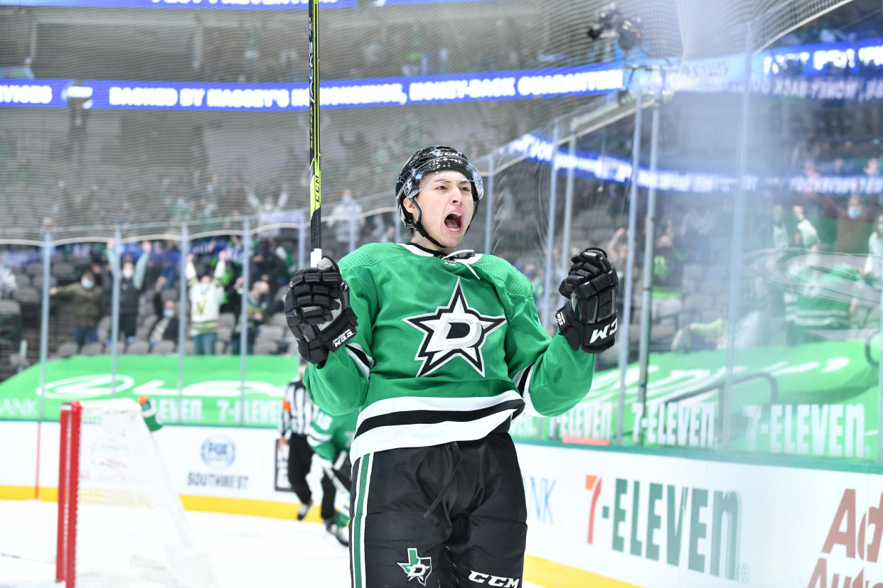 DALLAS, TX - MARCH 25: Jason Robertson #21 of the Dallas Stars celebrates a goal against the Tampa Bay Lightning at the American Airlines Center on March 25, 2021 in Dallas, Texas. (Photo by Glenn James/NHLI via Getty Images)