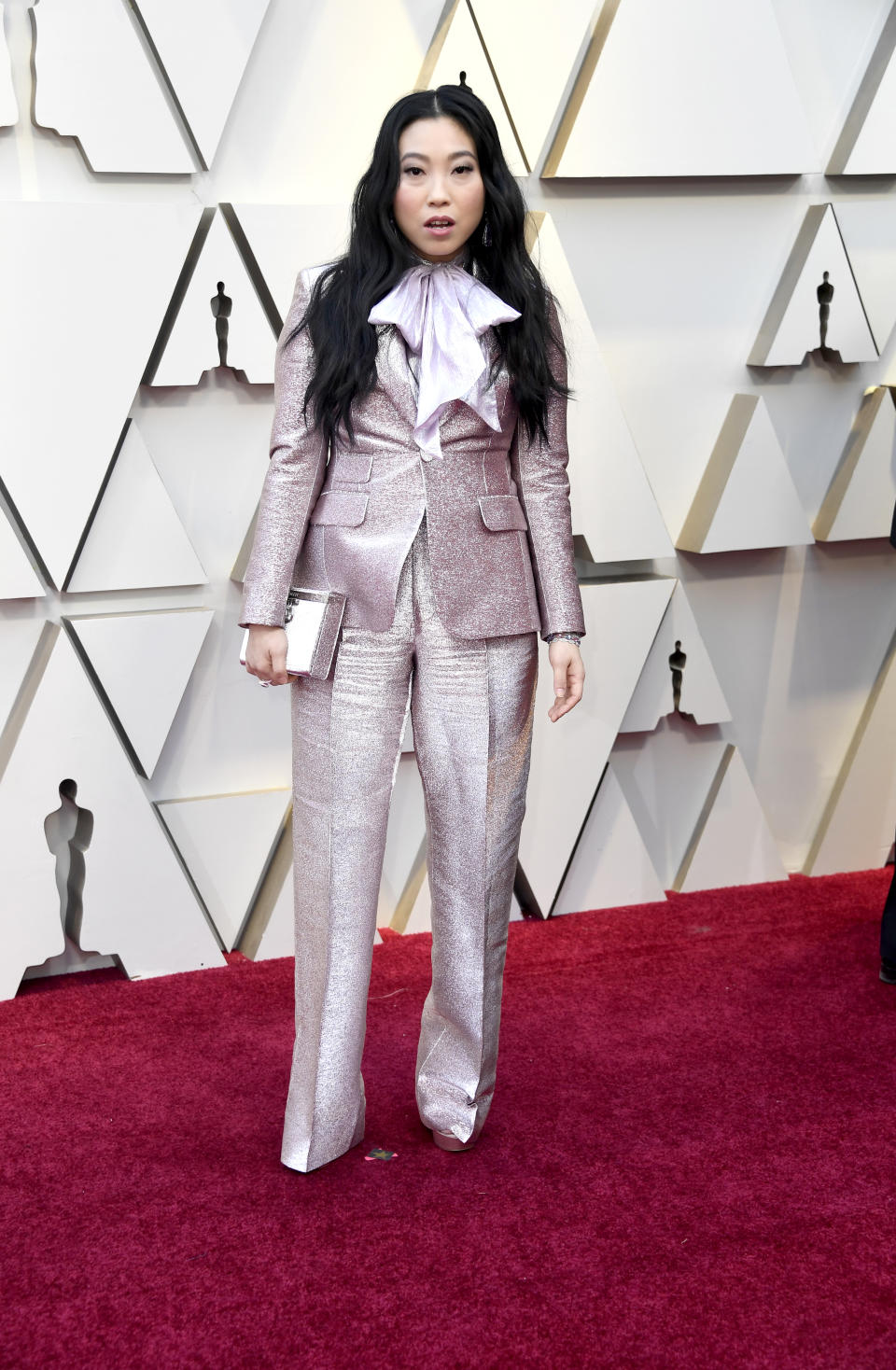 <p>The comedian and “Crazy Rich Asians” star mixed things up on the red carpet in a tuxedo by DSquared. <em>[Photo: Getty]</em> </p>