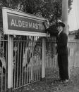 John Sugg polishes off the Aldermaston sign. It was one of over 2,000 stations axed