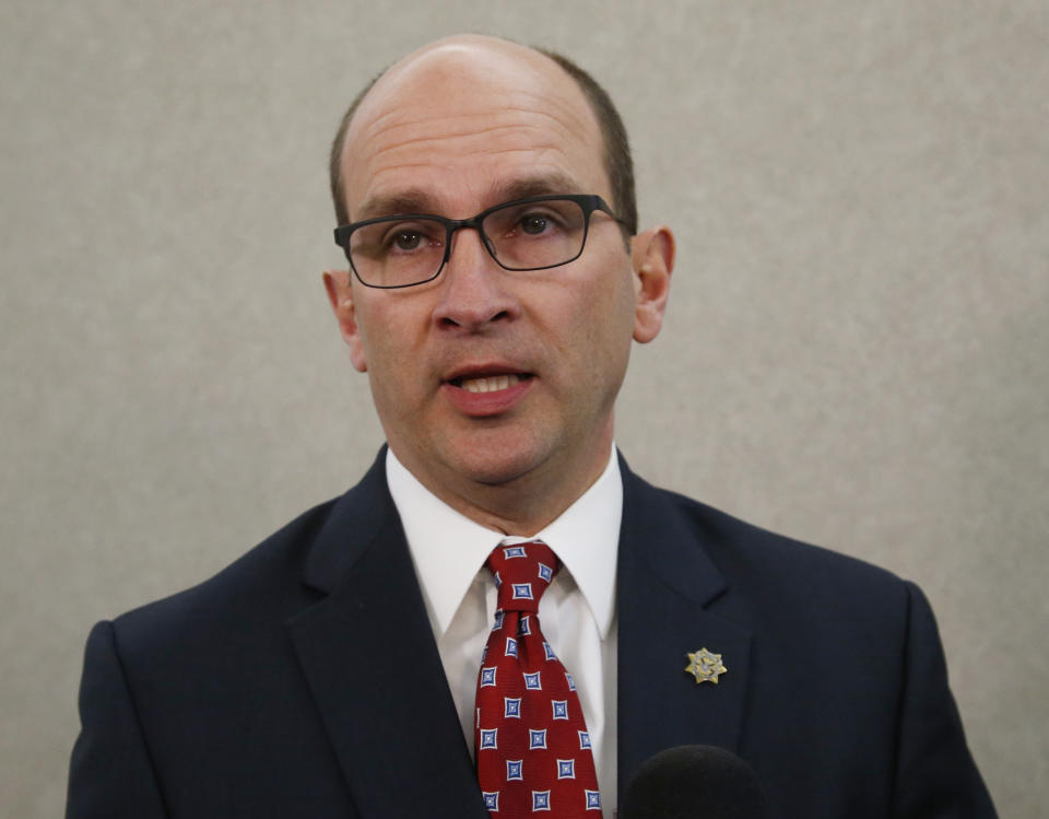 \ FILE - In this Friday, Dec. 15, 2017 file photo, Cleveland County District Attorney Greg Mashburn talks with the media in Norman, Okla. As many as ten death row inmates in Oklahoma, more than one-fifth of the state's prisoners condemned to die, could escape the death penalty because of a recent U.S. Supreme Court ruling about criminal jurisdiction in Indian Country. (AP Photo/Sue Ogrocki, File)