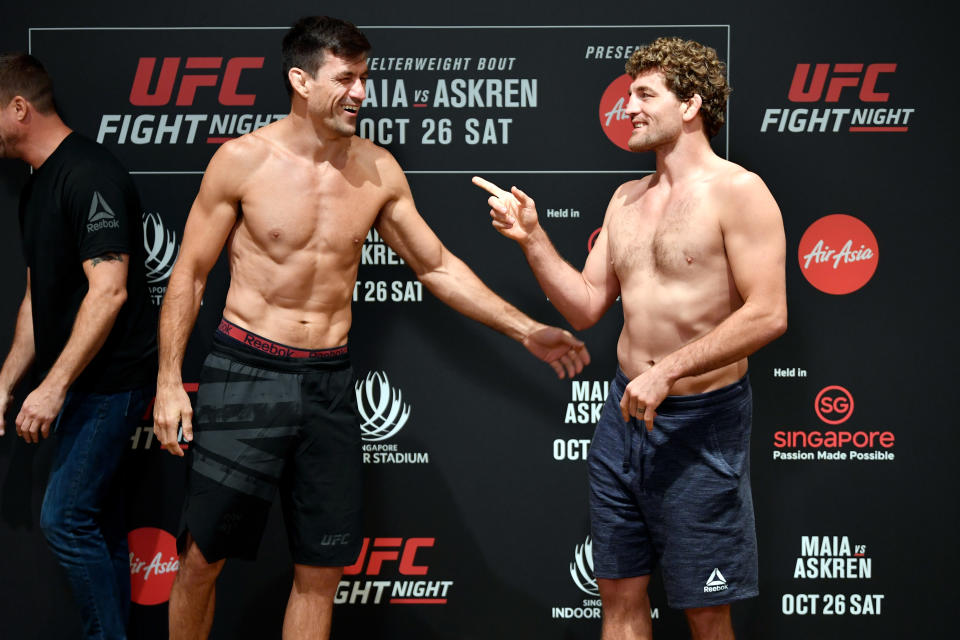 SINGAPORE, SINGAPORE - OCTOBER 25:  (L-R) Demian Maia of Brazil and Ben Askren interact during the UFC Fight Night weigh-in at the Mandarin Oriental on October 25, 2019 in Singapore, Singapore. (Photo by Jeff Bottari/Zuffa LLC via Getty Images)