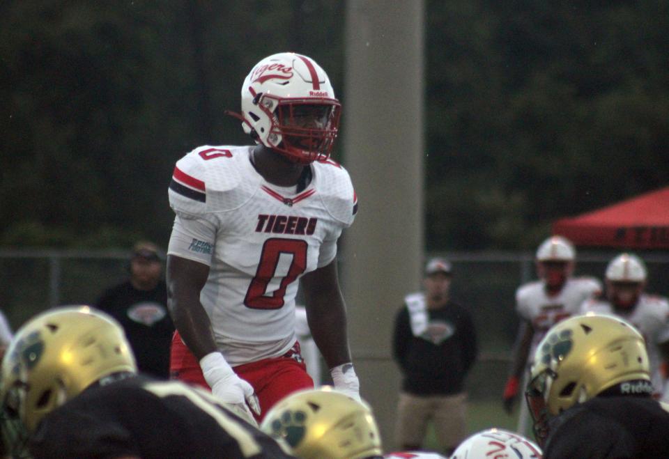 Jackson linebacker Grayson Howard (0) stares into the backfield before the snap against Nease during a high school football game on August 26, 2022. [Clayton Freeman/Florida Times-Union]