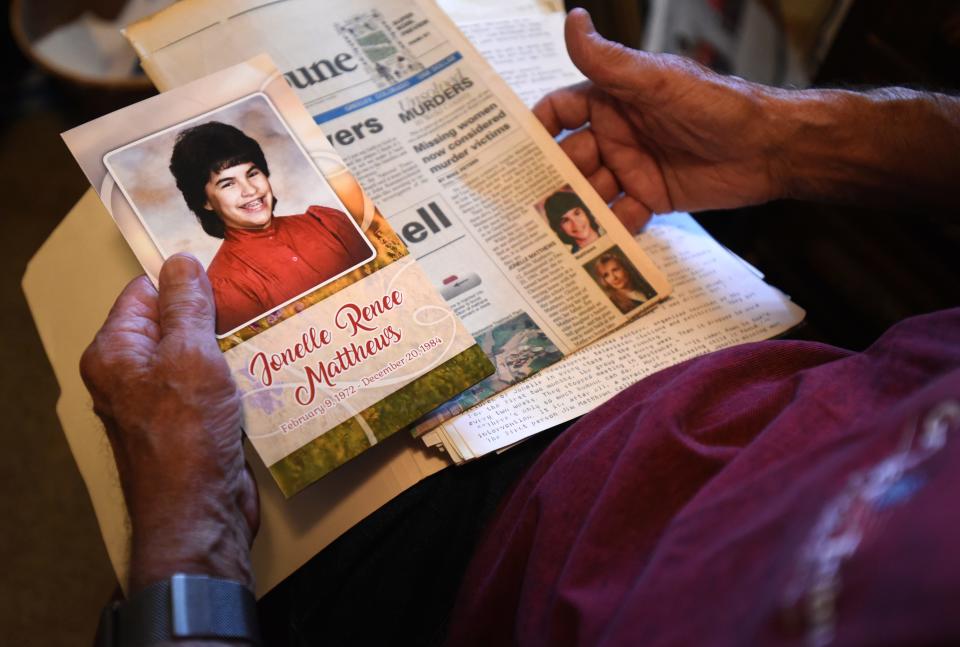 Mike Peters holds a photo of Jonelle Mattews in his home in Greeley.