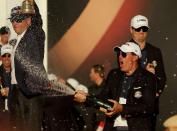 <p>Phil Mickelson of the United States celebrates with champagne after winning the Ryder Cup during the closing ceremony of the 2016 Ryder Cup at Hazeltine National Golf Club on October 2, 2016 in Chaska, Minnesota. (Photo by Streeter Lecka/Getty Images)</p>