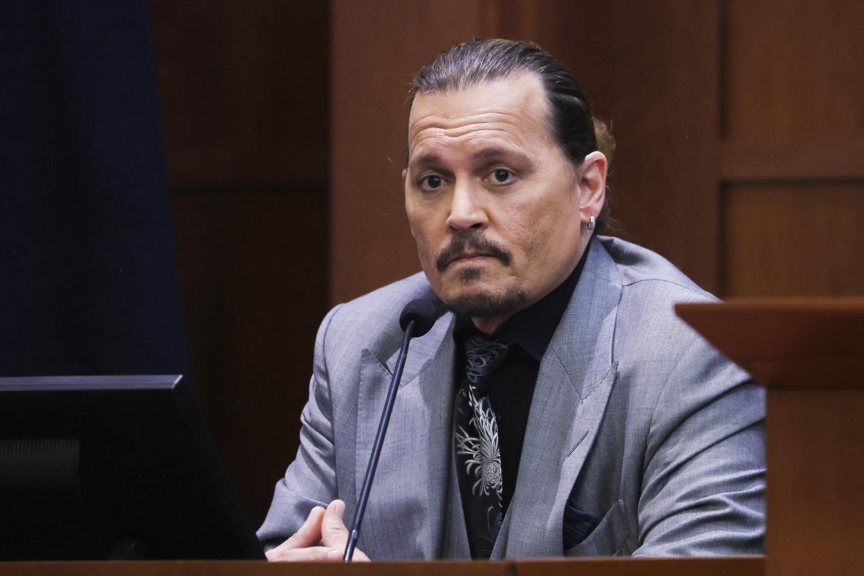 Johnny Depp testifies Wednesday in Fairfax County Circuit Court in Fairfax, Va. (Evelyn Hockstein / Pool via AP)