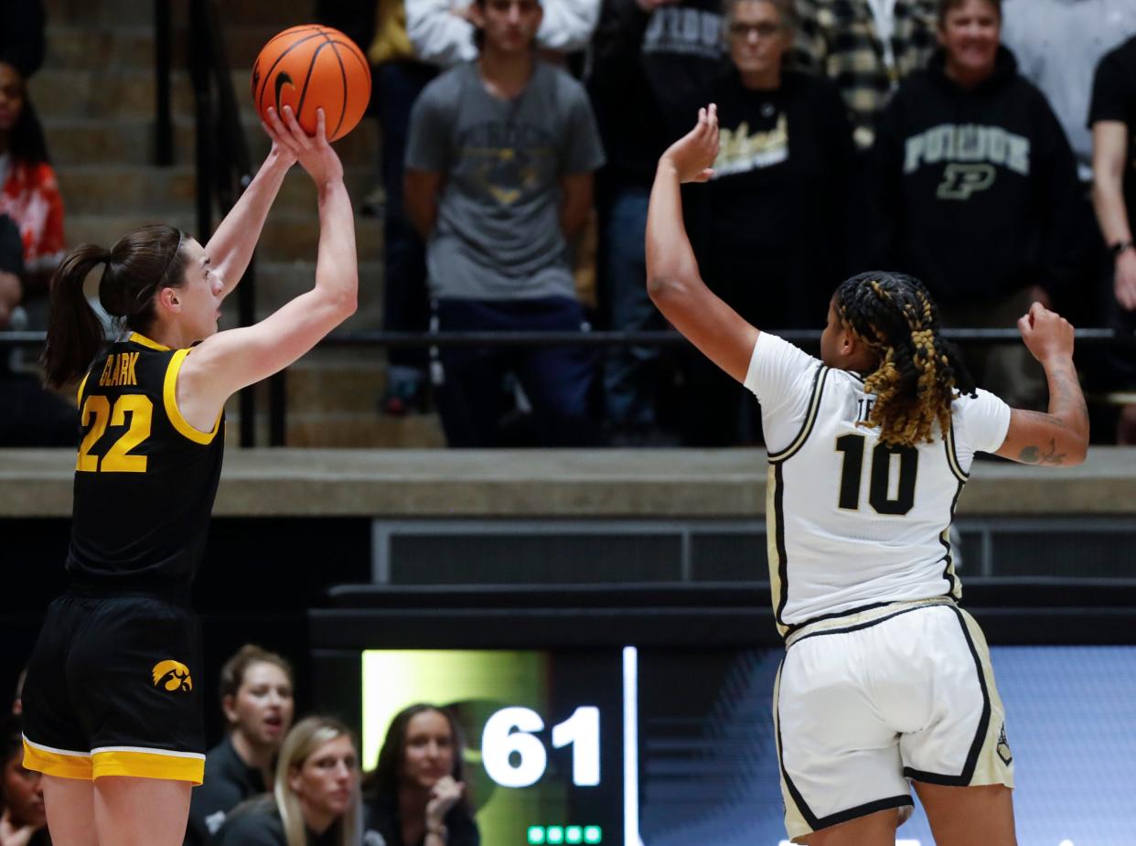 Iowa Hawkeyes guard Caitlin Clark (22) shoots the ball over Purdue Boilermakers guard Jeanae Terry (10) during the NCAA women’s basketball game, Wednesday, Jan. 10, 2024, at Mackey Arena in West Lafayette, Ind.