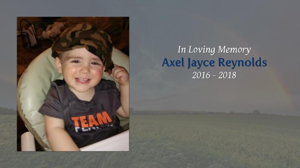 <div class="inline-image__caption"><p>Axel Reynolds died from being suffocated by a poisonous wet wipe, officials said.</p></div> <div class="inline-image__credit">Tribute Slides/Earle Funeral Home</div>