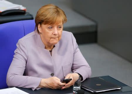 German Chancellor Angela Merkel attends a lower house of parliament Bundestag session in Berlin, Germany, April 27, 2017. REUTERS/Hannibal Hanschke