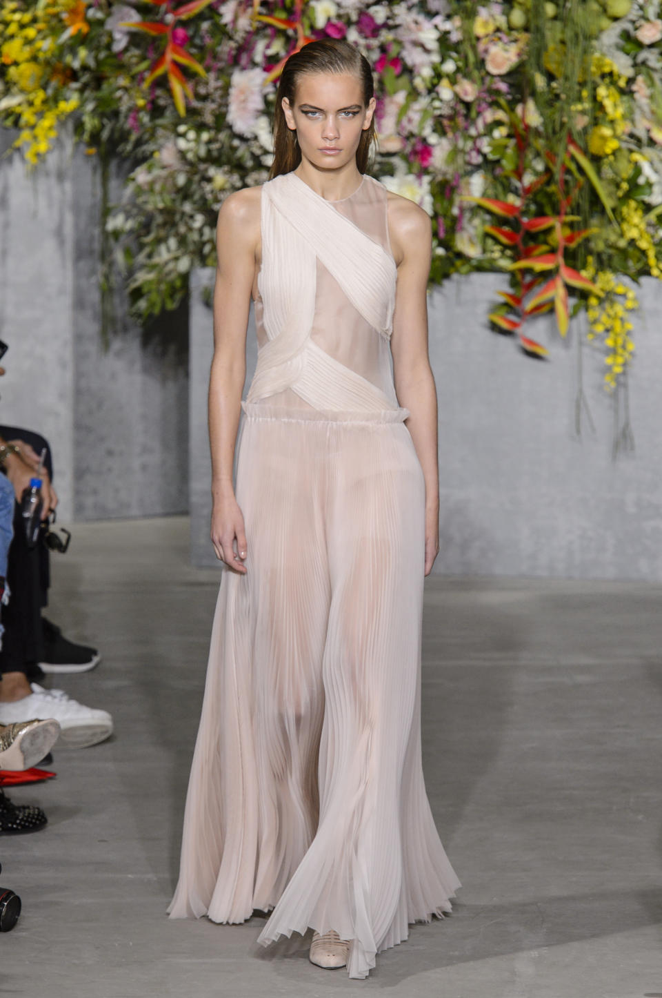 <p><i>A model wears a semi-sheer Grecian-style dress from the SS18 Jason Wu collection. (Photo: ImaxTree) </i></p>