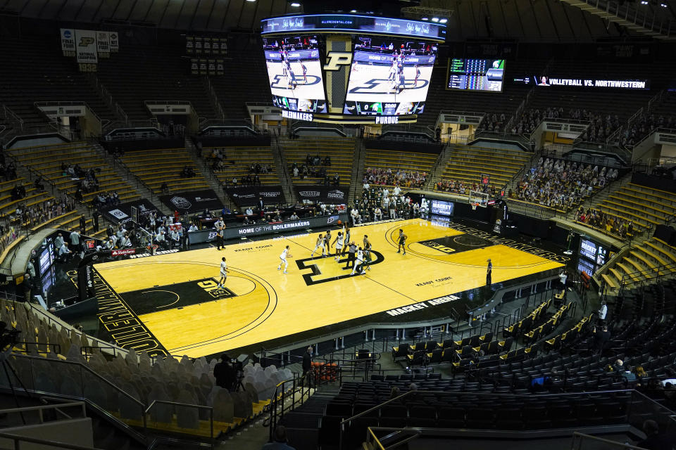 In this photo taken on Tuesday, Feb. 16, 2021, Purdue plays against Michigan State at Mackey Arena during the first half of an NCAA college basketball game in West Lafayette, Ind. Mackey Arena is one of six venues hosting NCAA Tournament games later this week. (AP Photo/Michael Conroy)