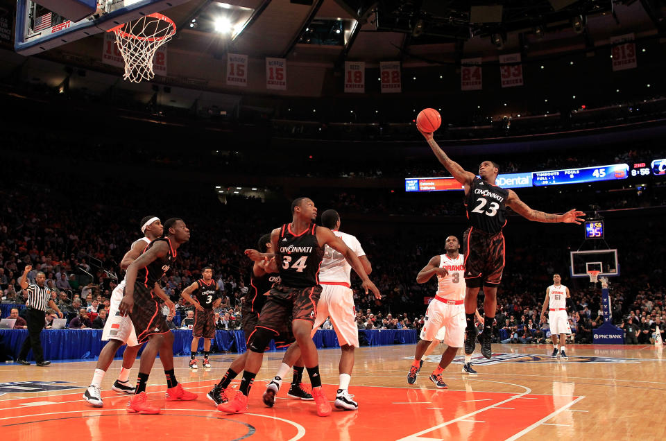 NEW YORK, NY - MARCH 09: Sean Kilpatrick #23 of the Cincinnati Bearcats gets a rebound against Dion Waiters #3 of the Syracuse Orange in the second half during the semifinals of the Big East men's basketball tournament at Madison Square Garden on March 9, 2012 in New York City. (Photo by Chris Trotman/Getty Images)