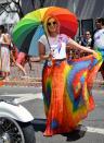 Also out at L.A. Pride: <em>Vanderpump Rules'</em> beloved bartender Madix wore a bright rainbow tie-dye skirt and accessorized with a matching rainbow-colored umbrella.