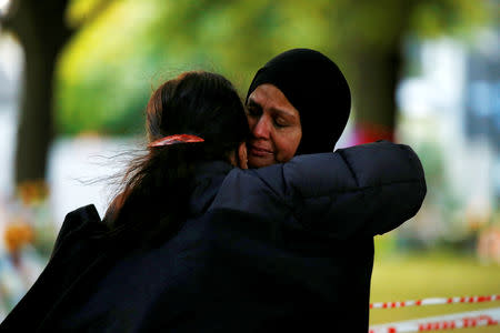 Women react outside of Al Noor Mosque in Christchurch, New Zealand March 21, 2019. REUTERS/Edgar Su