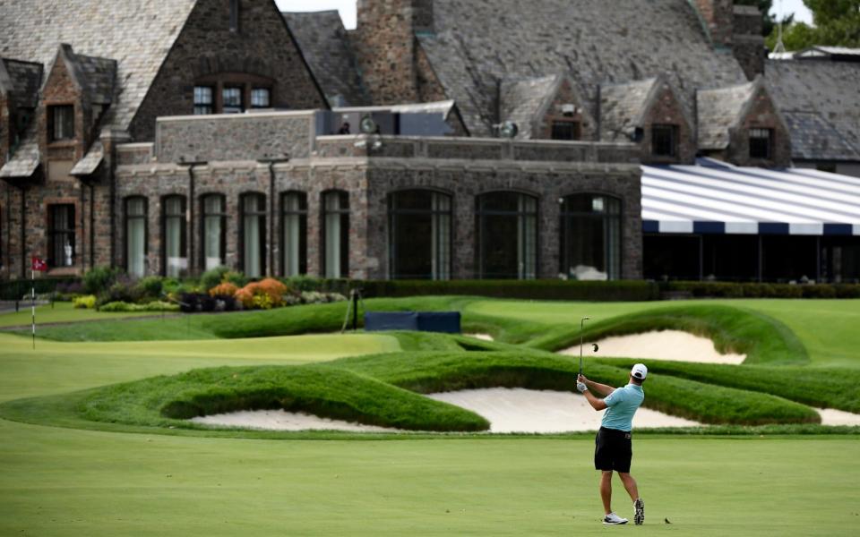 Canadian golfer Corey Connors drives on the ninth hole facing the clubhouse during a practice round for the 2020 U.S. Open golf tournament at Winged Foot Golf Club - Get ready for Winged Foot - one of the toughest canvasses that golf's artists face on the majors circuit - USA TODAY SPORTS