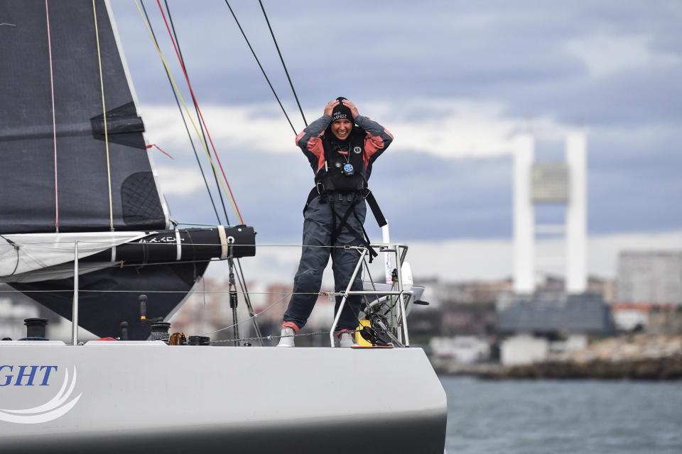 This photo provided by Cole Brauer Ocean Racing shows Brauer as she became the first American woman to race nonstop around the world by herself when she arrived Thursday, March 7, 2024, in A Coruña, Spain. (James Tomlinson/Cole Brauer Ocean Racing via AP)