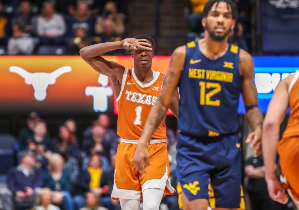 Texas guard Andrew Jones celebrates a made 3-pointer during the Longhorns' 82-81 win over West Virginia at WVU Coliseum in Morgantown, W. Va. on Feb. 26. Jones is the 10th leading scorer in Texas program history.