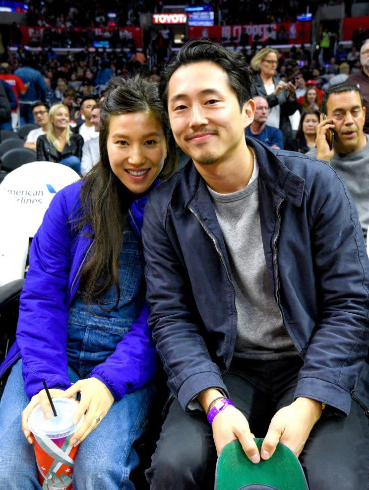 Steven Yeun and Joana Pak at a Detroit Pistons-Los Angeles Clippers game at Staples Center in November, when it was just the two of them. (Photo: Noel Vasquez/GC Images)