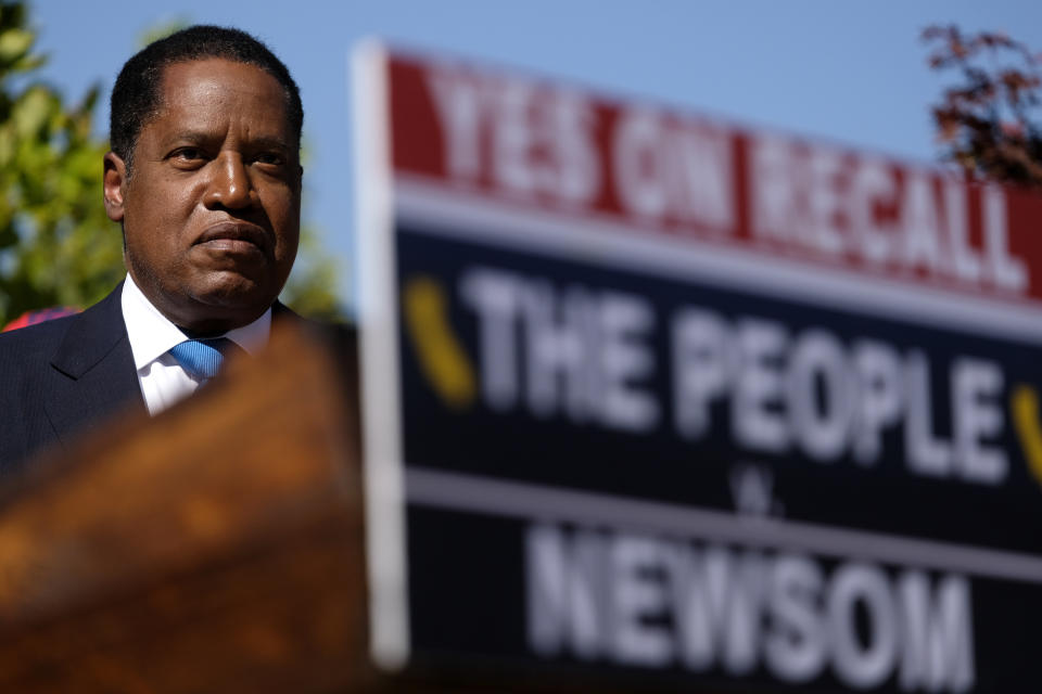 Republican conservative radio show host Larry Elder attends a rally for the California gubernatorial recall election on Monday, Sept. 13, 2021, in Monterey Park, Calif. (AP Photo/Ringo H.W. Chiu)