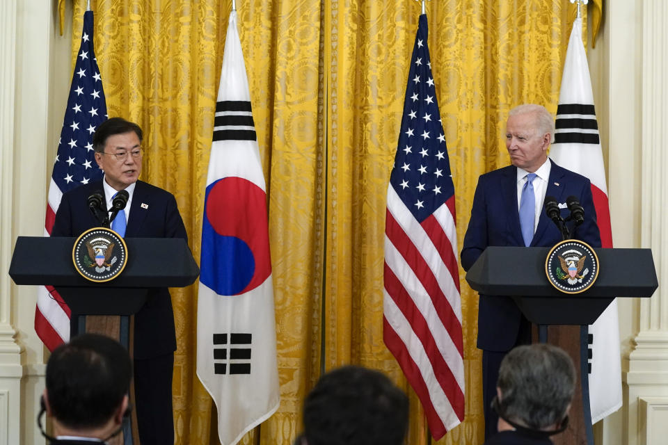 FILE - In this May 21, 2021, file photo, U.S. President Joe Biden listens as South Korean President Moon Jae-in speaks during a joint news conference in the East Room of the White House in Washington. State media say North Korean leader Kim Jong Un vowed to launch an “uncompromising struggle” against anti-socialist elements and build a perfect self-supporting economy. Kim's comments released Thursday, May 27, 2021 come as he seeks greater internal strength to overcome pandemic-related difficulties and U.S.-led sanctions. (AP Photo/Alex Brandon, File)