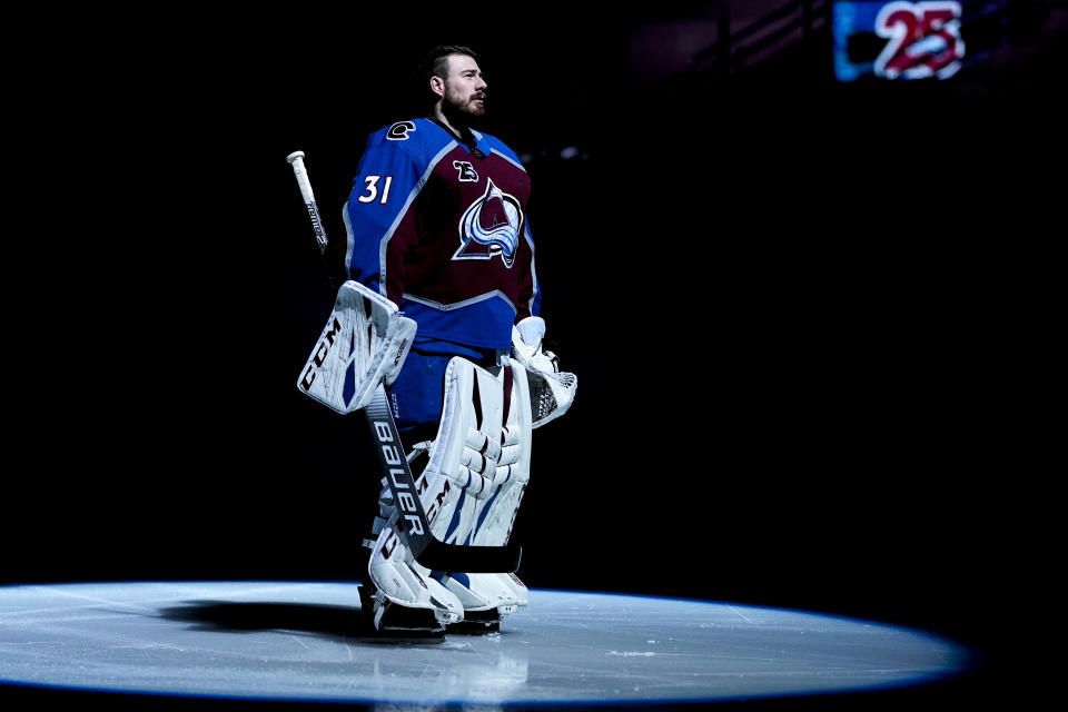 Colorado Avalanche goaltender Philipp Grubauer stands on the ice during player introductions before the team's NHL hockey game against the Los Angeles Kings on Wednesday, May 12, 2021, in Denver. (AP Photo/Jack Dempsey)