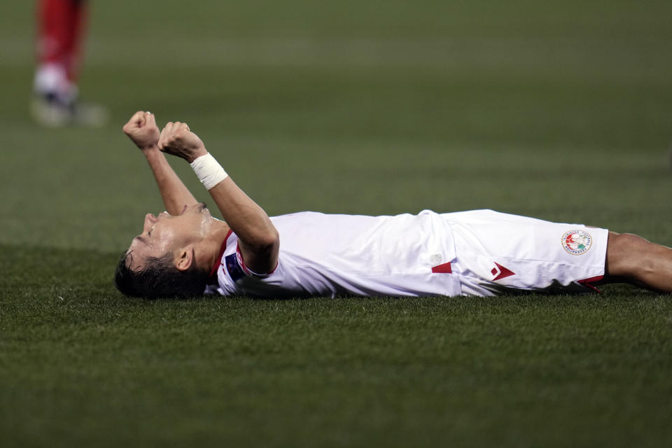 CORRECTS PLAYERS NAME - Tajikistan's Khamrokulov Nuriddin celebrates after beating Lebanon during the Asian Cup Group A soccer match between Lebanon v Tajikistan at Jassim Bin Hamad Stadium in Doha, Qatar, Monday, Jan. 22, 2024. (AP Photo/Aijaz Rahi)