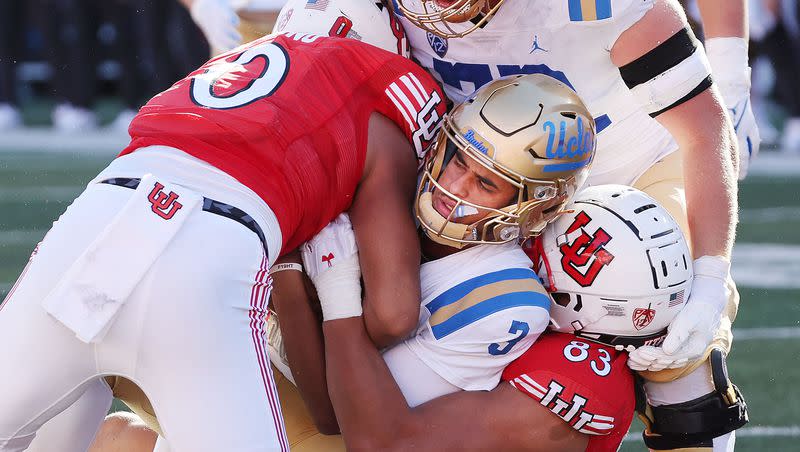 Utah Utes defensive end Jonah Elliss (83) sacks UCLA quarterback Dante Moore at the end of the game in Salt Lake City on Saturday, Sept. 23, 2023. Utah won 14-7.