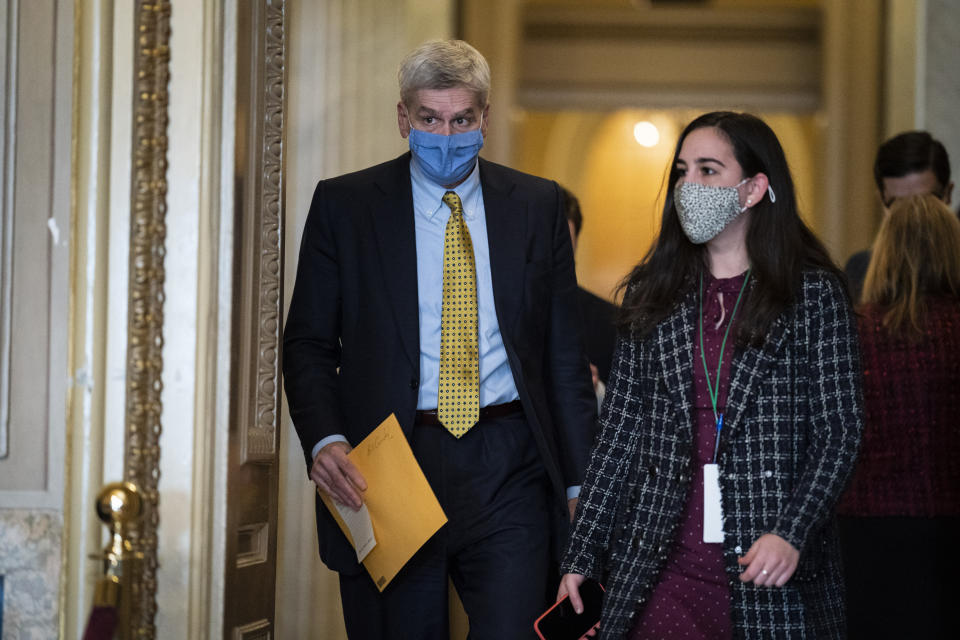 Sen. Bill Cassidy, R-La., walks in the Capitol on the fourth day of the Senate Impeachment trials for former President Donald Trump on Capitol Hill, Friday, Feb 12, 2021 in Washington. (Jabin Botsford/The Washington Post via AP, Pool)