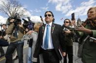 Senator Patrick Brazeau arrives on Parliament Hill in Ottawa October 22, 2013. The Senate is debating whether to suspend senators Brazeau, Pamela Wallin and Mike Duffy without pay. REUTERS/Chris Wattie (CANADA - Tags: POLITICS)