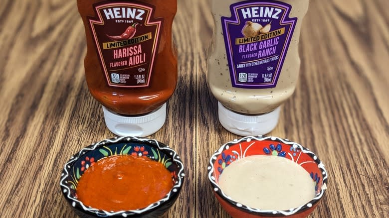 Two sauce bottles with ramekins 