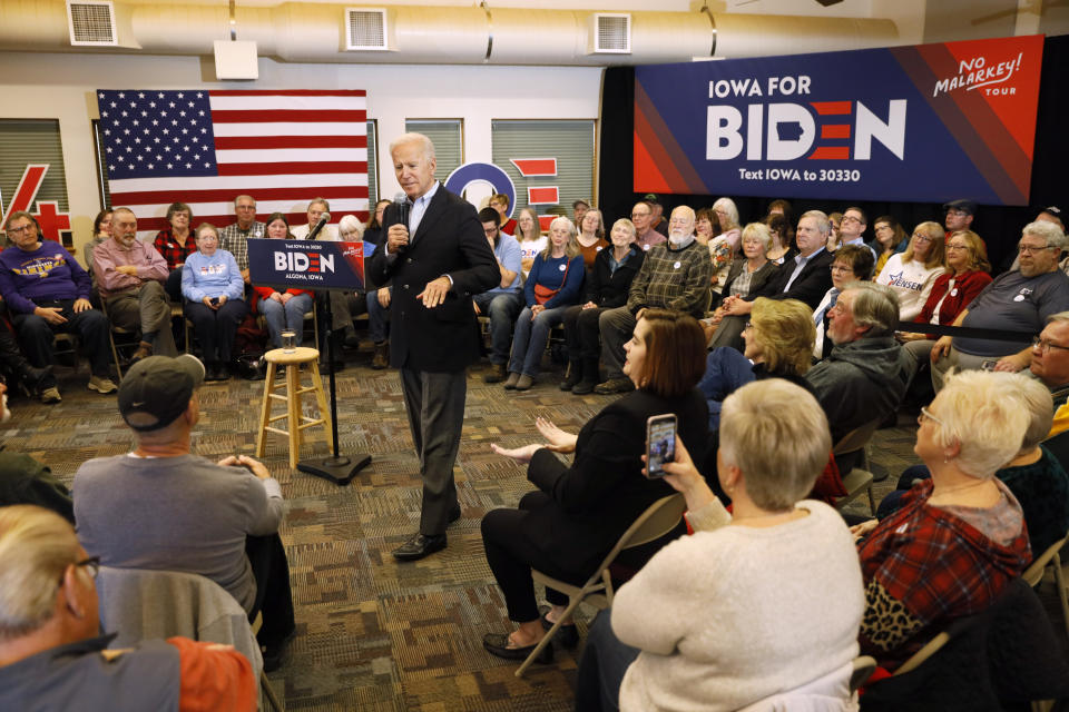Democratic presidential candidate former U.S. Vice President Joe Biden speaks to local residents during a bus tour stop at Water's Edge Nature Center, Monday, Dec. 2, 2019, in Algona, Iowa. (AP Photo/Charlie Neibergall)